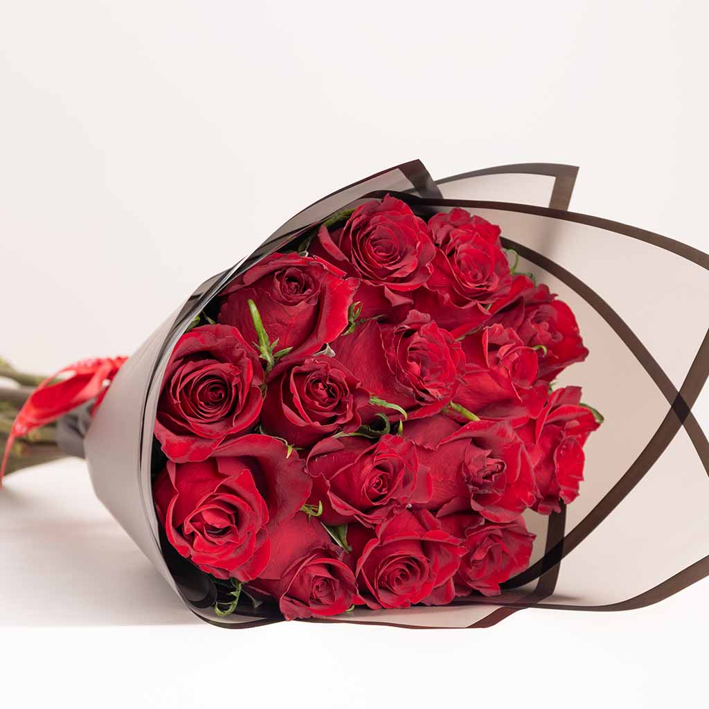 product-image-Patchi Tin Box of 22 Pieces | Red Roses Hand Bouquet