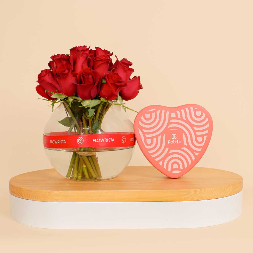 Flowrista Online Flowers Shop Patchi Tin Box of 22 Pieces  | A vase of 20 red roses