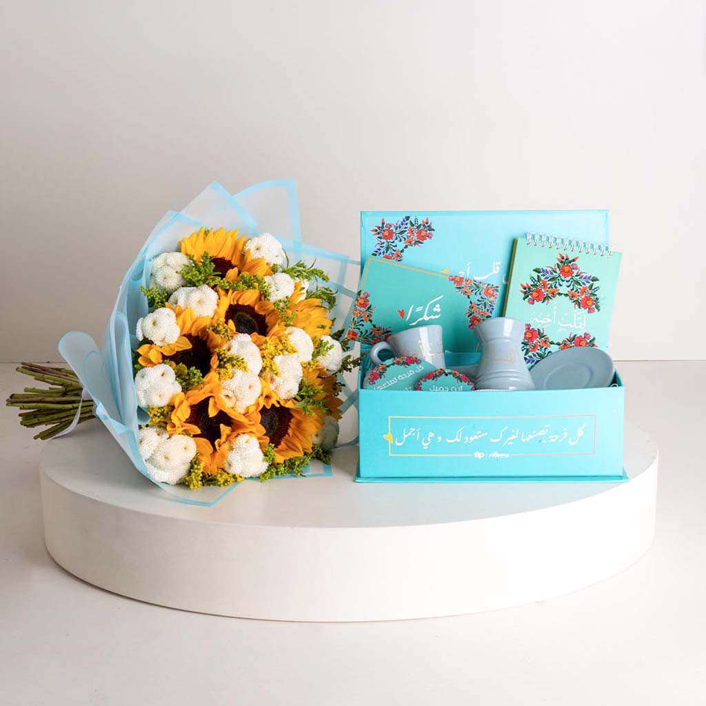 Flowrista Online Flowers Shop علبة قهوة لقلبٍ أحبه وباقة زهور عباد الشمس