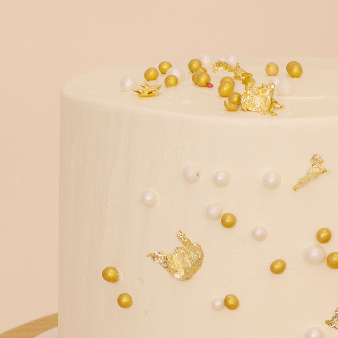product-image-Ninos Golden Celebrations Cake with Love Topper & Pink Roses