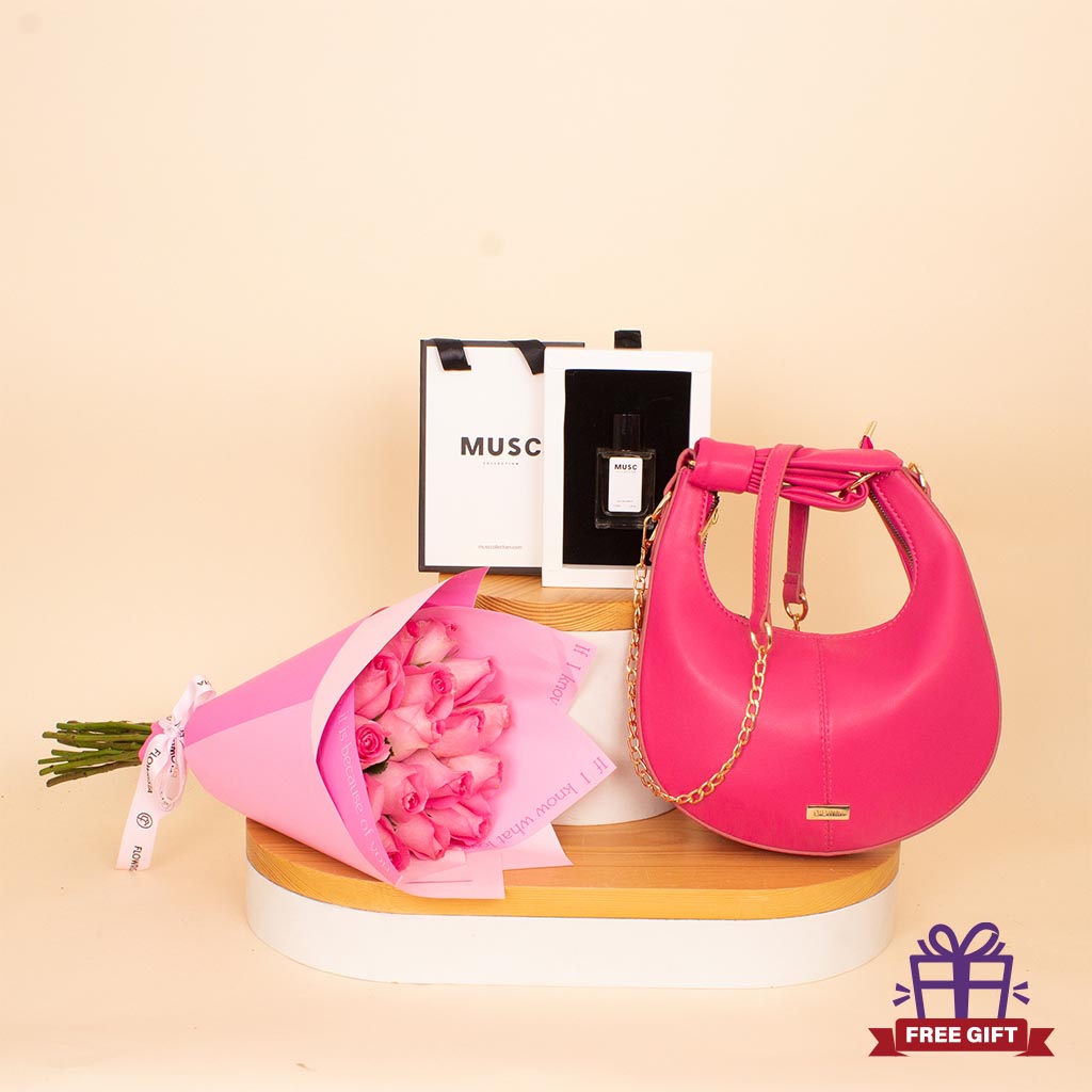 Flowrista Online Flowers Shop Alamki Bella Fuchsia Bag & MUSC Oud Musc Perfume with Pink Roses Bouquet